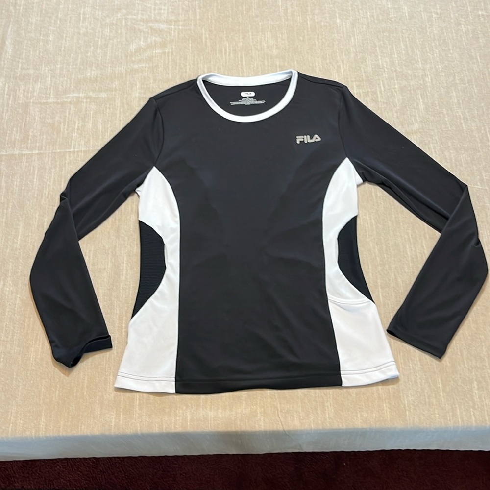 FILA  athletic black and white long sleeve top. Size Medium Pit to pit is 18”